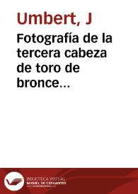 Fotografía de la tercera cabeza de toro de bronce hallada en Costig; en el reverso hay un recorte del periódico La Última Hora sobre una excursión...